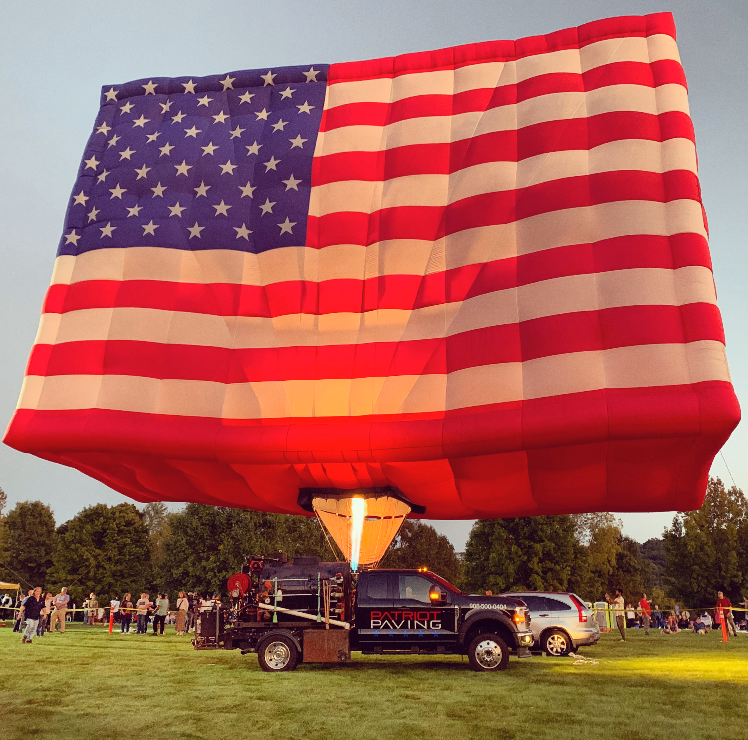 Patriot Paving under American flag hot air baloon